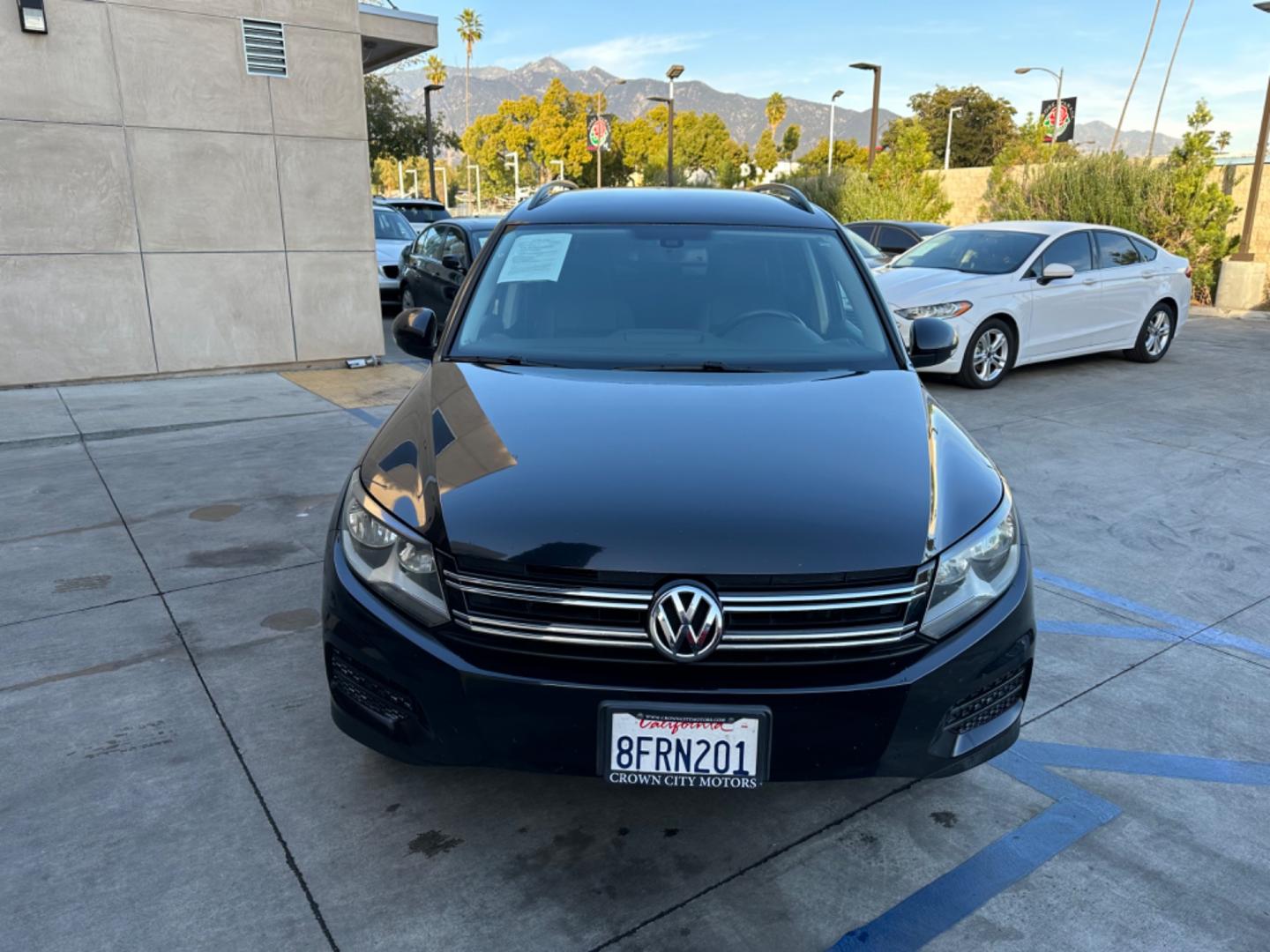 2016 Black /Black Volkswagen Tiguan (WVGAV7AX5GW) , AUTOMATIC transmission, located at 30 S. Berkeley Avenue, Pasadena, CA, 91107, (626) 248-7567, 34.145447, -118.109398 - Crown City Motors is a used “Buy Here Pay Here” car dealer in Pasadena CA. “Buy Here Pay Here” financing, means that when you purchase your vehicle from our dealership, that you make the payments to the dealership as well. We do not need the banks approval to get you approved for a used auto - Photo#7